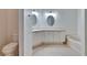 Bathroom features tile floors, vanity and a bath tub with shower head at 11542 Captiva Kay Dr, Riverview, FL 33569