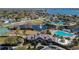 Aerial view of the community clubhouse with a pool, playground, and other amenities for a vibrant neighborhood at 11542 Captiva Kay Dr, Riverview, FL 33569