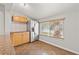 Bright breakfast nook in the kitchen, with stainless steel refrigerator and granite countertops at 1818 53Rd S St, Gulfport, FL 33707