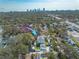 Aerial view of the home in its neighborhood with Tampa visible in the distance at 243 28Th N Ave, St Petersburg, FL 33704