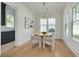 Dining area featuring modern chandelier and lots of natural light at 243 28Th N Ave, St Petersburg, FL 33704