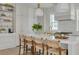 Kitchen island with marble countertop and breakfast bar, ideal for entertaining guests at 243 28Th N Ave, St Petersburg, FL 33704