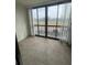 Cozy balcony with tile floor and sliding glass doors offering outdoor views at 2591 Countryside Blvd # 5203, Clearwater, FL 33761