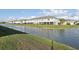 Scenic view of condos along the water at 25993 Woven Wicker Bnd, Lutz, FL 33559