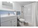 Clean bathroom featuring a shower and tub, vanity, and fresh paint at 330 6Th Ave, Indian Rocks Beach, FL 33785