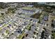 Extensive aerial view of a residential community showcasing the layout of homes and neighborhood streets at 3808 Cat Mint St, Tampa, FL 33619