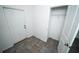 An entryway with ceramic tiled floors, white walls, and a coat closet at 3808 Cat Mint St, Tampa, FL 33619