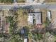 Overhead shot reveals house and surrounding yard, plus neighboring houses at 3817 N 54Th St, Tampa, FL 33619