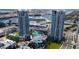 Stunning aerial view of the Towers condo complex featuring a pool, cruise ship and waterfront access at 449 S 12Th St # 1105, Tampa, FL 33602