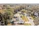 Aerial view showing homes with well-maintained yards and solar panels at 4504 Grainary Ave, Tampa, FL 33624