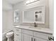 Modern bathroom featuring a vanity with drawers and a mirror at 4504 Grainary Ave, Tampa, FL 33624