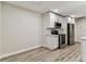 Spacious kitchen area with stainless steel appliances and bright white cabinetry at 4504 Grainary Ave, Tampa, FL 33624