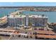 This is an overhead view of the building with water in the background at 500 Treasure Island Cswy # 404, Treasure Island, FL 33706