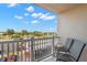 Balcony with seating providing serene views of the surrounding neighborhood at 500 Treasure Island Cswy # 404, Treasure Island, FL 33706