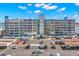 The building features a tower, balconies, and a convenient parking lot at 500 Treasure Island Cswy # 404, Treasure Island, FL 33706