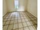 Bedroom featuring tile flooring and bright natural light at 5627 Ashley Oaks Dr # 4, Tampa, FL 33617