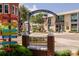 Dunedin street view featuring signage, landscaping, and local businesses, a welcoming community scene at 567 Baywood S Dr, Dunedin, FL 34698