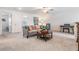 Bright living room with neutral tones, comfortable seating, and stylish decor at 6256 Shiner St, Land O Lakes, FL 34638