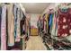 Spacious walk-in closet with shelves, clothing racks, and plenty of storage at 7301 Avocet Dr, Wesley Chapel, FL 33544