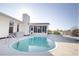 Backyard pool featuring sunroom addition to the main home at 7623 Mako Dr, Hudson, FL 34667