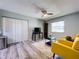 This inviting living room features new flooring and offers ample natural light and an open layout at 10525 Mira Vista Dr, Port Richey, FL 34668