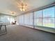 Spacious sunroom showcasing large windows and ample seating areas for relaxation at 10525 Mira Vista Dr, Port Richey, FL 34668