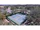 Aerial view of community tennis courts showcasing well-maintained facilities at 10525 Mira Vista Dr, Port Richey, FL 34668