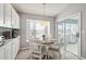 Cozy breakfast nook with table and seating, natural light, and access to the patio at 2509 Estancia Blvd, Clearwater, FL 33761