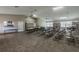 Large meeting room with ample seating, tables, and natural light from the windows at 2509 Estancia Blvd, Clearwater, FL 33761