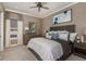 Comfortable bedroom with soft, neutral tones, ceiling fan, and elegant furniture at 29924 Rusco Ct, Wesley Chapel, FL 33545