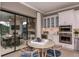 Bright dining area with modern appliances, including double ovens and a wine cooler at 29924 Rusco Ct, Wesley Chapel, FL 33545