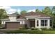 Charming single-story home with a two-car garage and manicured lawn and appealing stone accents at 29924 Rusco Ct, Wesley Chapel, FL 33545