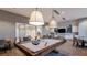 Community game room with a pool table, seating, and kitchenette area, ideal for recreation and socializing at 29924 Rusco Ct, Wesley Chapel, FL 33545