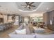 Spacious living room and dining room design featuring contemporary decor and lots of natural light at 29924 Rusco Ct, Wesley Chapel, FL 33545