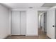 Bedroom with closet and luxury vinyl plank flooring at 306 Midwood Dr, Plant City, FL 33566