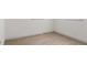 White bedroom with luxury vinyl plank flooring at 306 Midwood Dr, Plant City, FL 33566