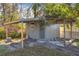 A detached outdoor shed with an awning and a weathered exterior at 306 Midwood Dr, Plant City, FL 33566