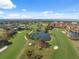 Breathtaking aerial view of the golf course and surrounding landscapes at 3092 Osprey Ln, Clearwater, FL 33762