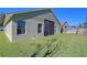 Beautiful backyard with green grass and privacy fence at 3133 Beaver Pond Trl, Valrico, FL 33596