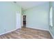 Spacious bedroom offers a large closet, hardwood floors, and soothing colors at 3133 Beaver Pond Trl, Valrico, FL 33596
