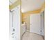 Bathroom featuring a shower, tile floors, and a sink with storage at 334 Club Manor Dr, Sun City Center, FL 33573