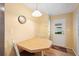 Cozy dining nook featuring natural light and an adjacent door to the outside at 37841 Mission Hills Ave, Zephyrhills, FL 33541