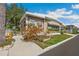 Charming home with well-maintained landscaping, brick foundation, and a welcoming walkway at 37841 Mission Hills Ave, Zephyrhills, FL 33541