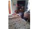 Comfortable bedroom with floral bedding, cozy decor, and dresser offering practical storage space at 39349 & 39343 Rusbe Dr, Zephyrhills, FL 33540