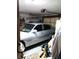 Attached garage with a car parked inside at 39349 & 39343 Rusbe Dr, Zephyrhills, FL 33540
