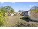 Private backyard setting with lush trees and greenery at 4408 W Lackland Pl, Tampa, FL 33616