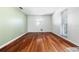 Bright and airy bedroom with hardwood floors and a large window allowing for ample natural light at 4408 W Lackland Pl, Tampa, FL 33616