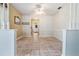 Dining area with tile flooring, offering an open view to the kitchen and adjoining living space at 4408 W Lackland Pl, Tampa, FL 33616