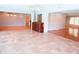 Spacious living room featuring tile flooring, neutral paint, and an open floor plan, perfect for entertaining at 4609 W San Miguel St, Tampa, FL 33629