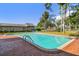 Backyard pool with brick patio, ideal for relaxing and enjoying outdoor activities at 4609 W San Miguel St, Tampa, FL 33629